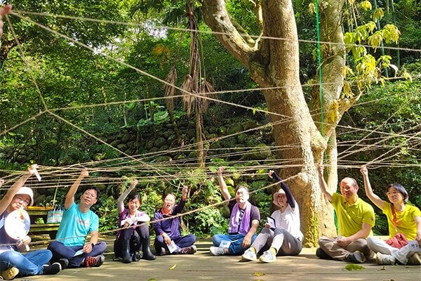 Photo of Zyxel employees working on the Environmental Trust—Nature Valley Forest Restoration Project.